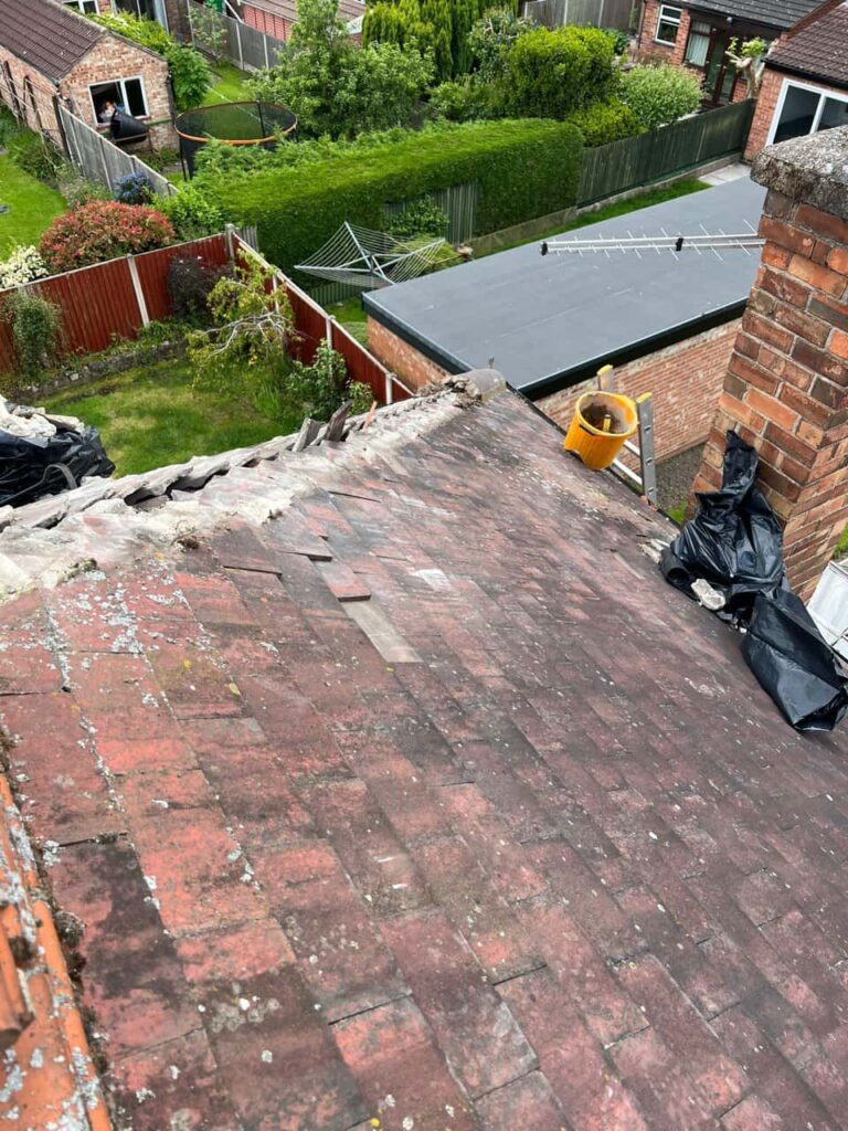 This is a photo of a roof where the hip tiles have been removed, and are just about to be replaced. Works carried out by TRP Roofing Withernsea