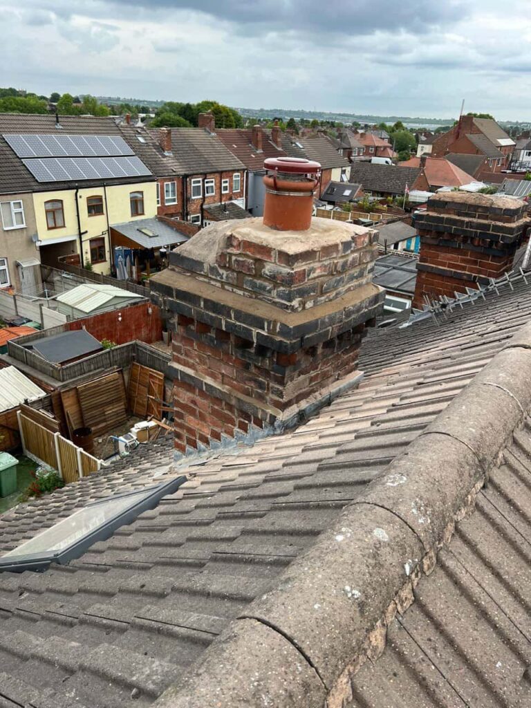 This is a photo taken from a roof which is being repaired by TRP Roofing Withernsea it shows a street of houses, and their roofs
